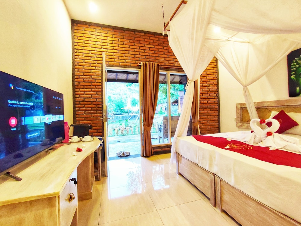 Deluxe Room - Photo 1
