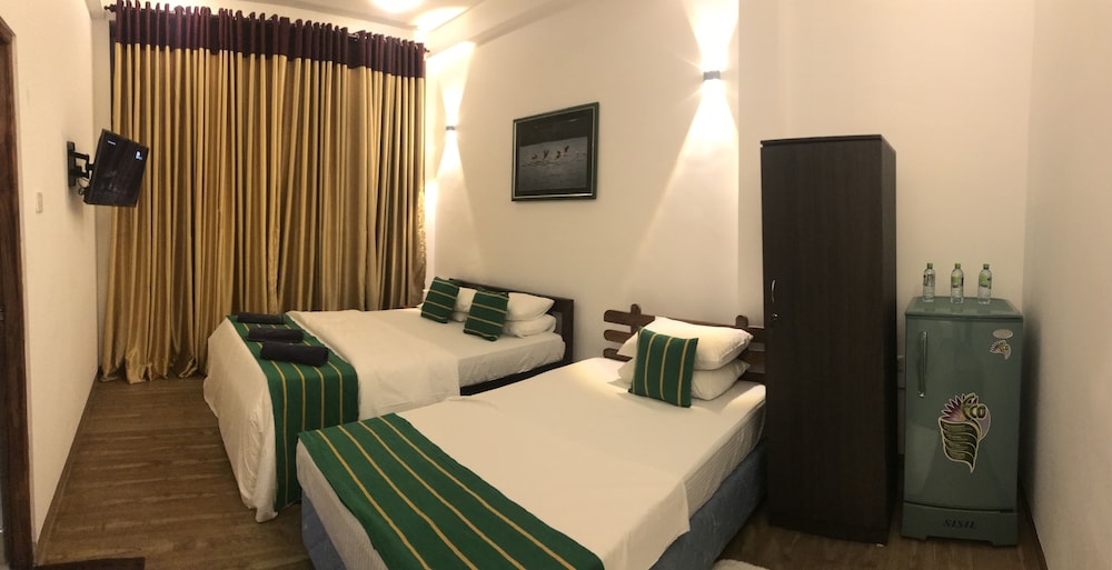 Deluxe Triple Room, 1 Bedroom, Garden View photo 1