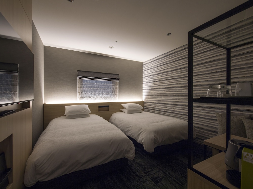 Standard Twin Room - Photo 11