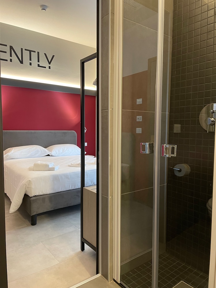 Design Triple Room, Multiple Beds, Balcony, City View photo 3