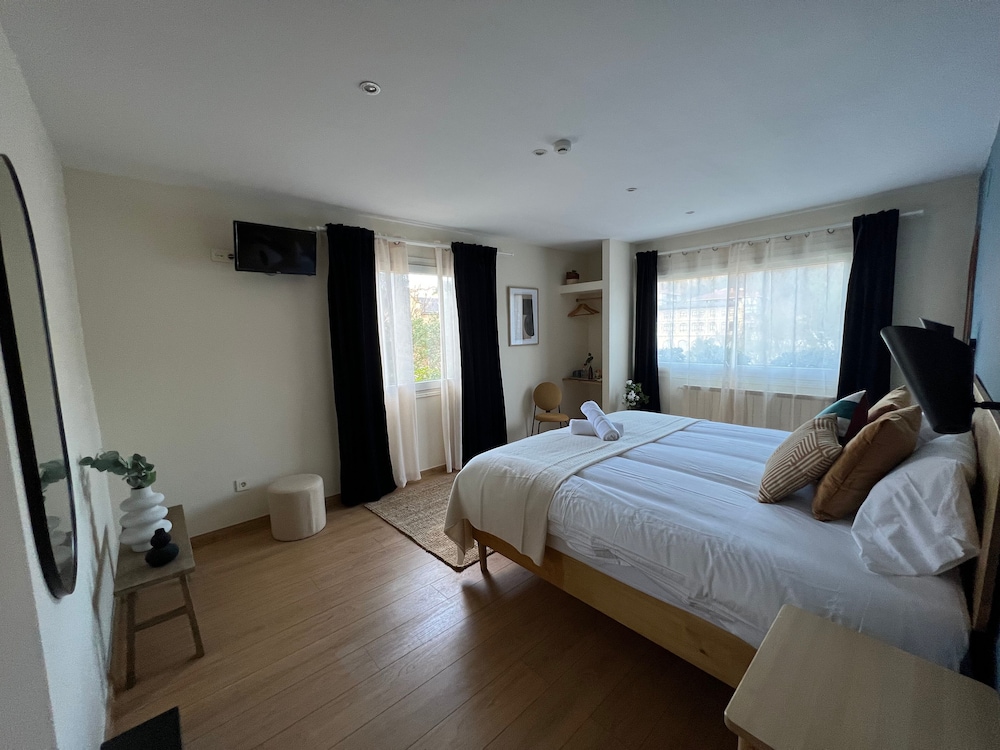 Economy Quadruple Room, Garden View photo 2