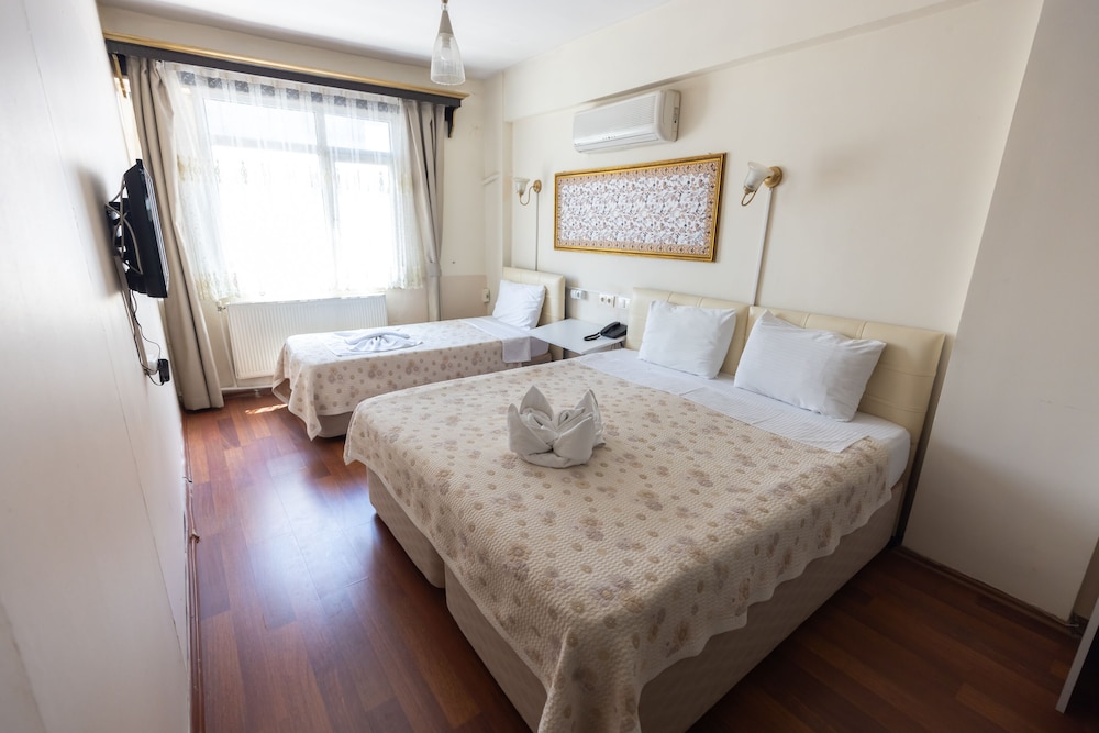 Standard Triple Room - Photo 7