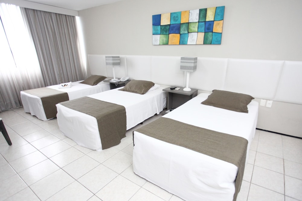 Deluxe Triple Room - Photo 9