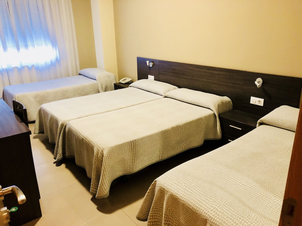 Quadruple Room (2 Adults + 2 Childs)