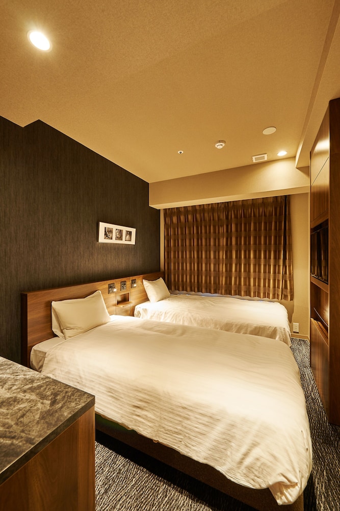 Single Use - Standard Twin Room (No Housekeeping) photo 2