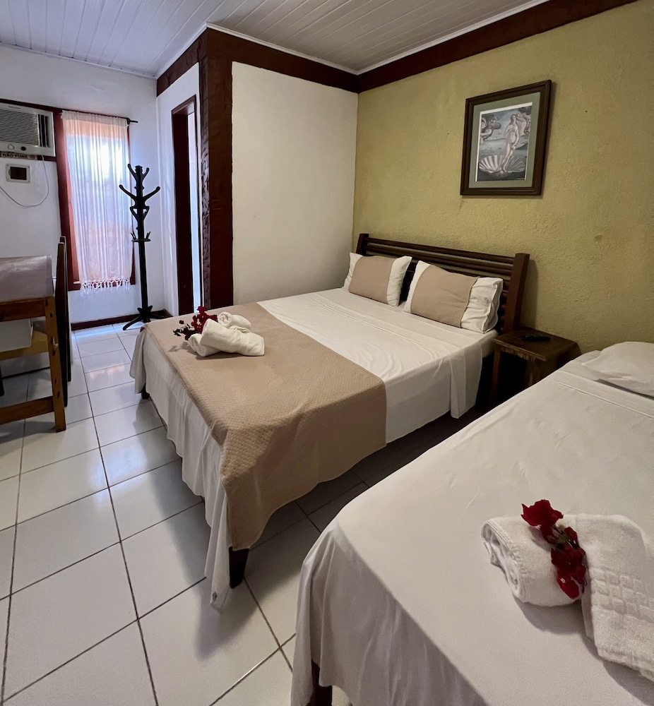 Economy Triple Room photo 2