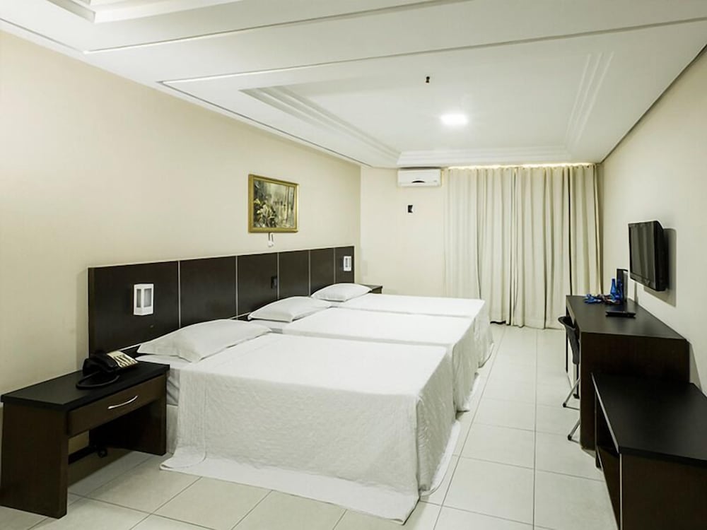 Crystal Plaza Hotel — Luxury Triple Room