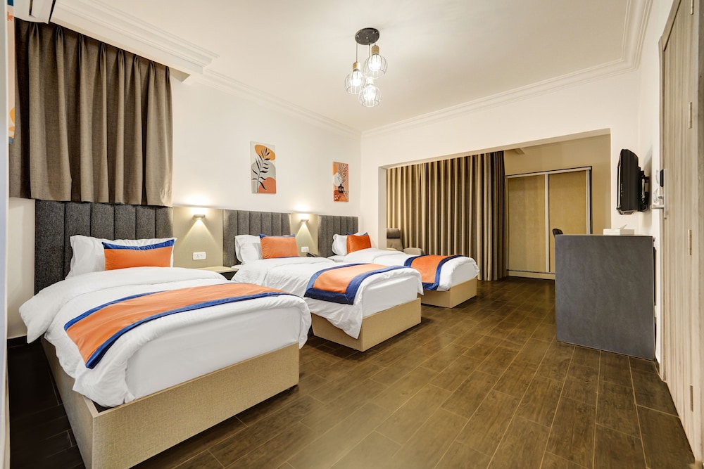 Deluxe Triple Room, City View photo 2