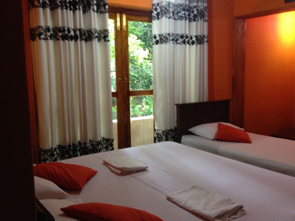 Deluxe Triple Room, Garden View photo 3