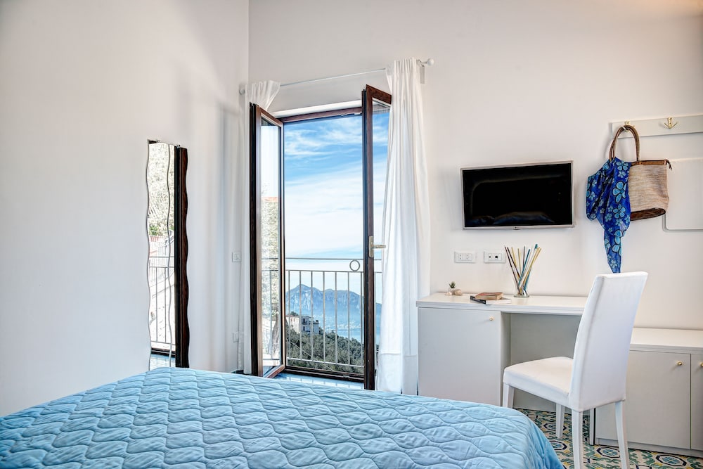 Deluxe Quadruple Room, 2 Bedrooms, Non Smoking, Ocean View photo 1