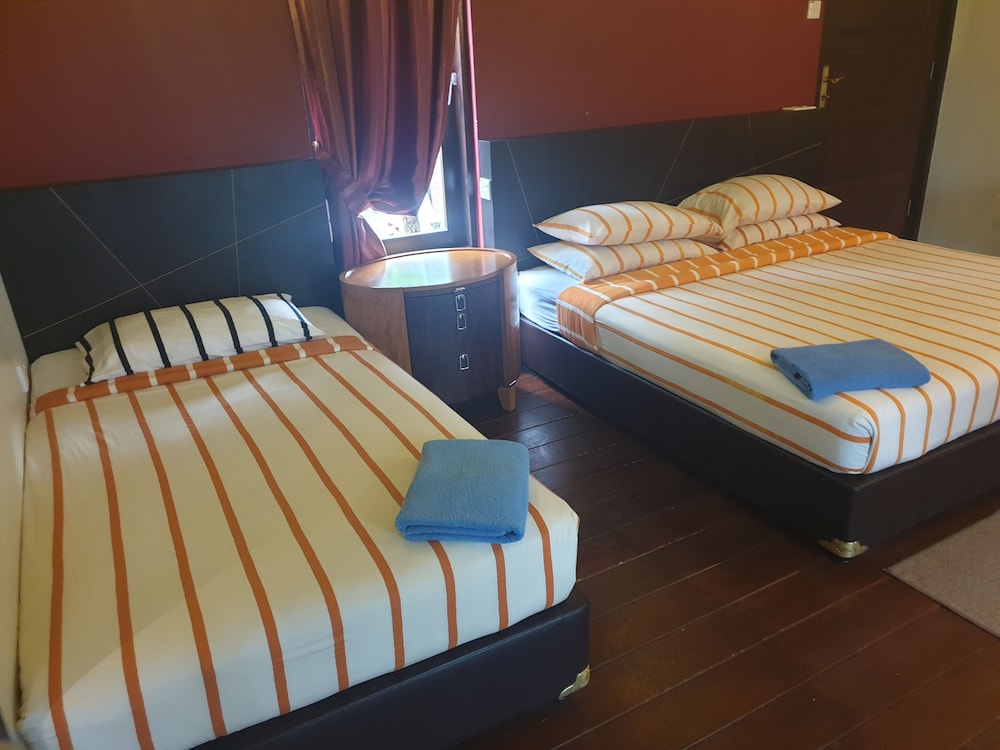 Deluxe Triple Room, Garden View photo 1