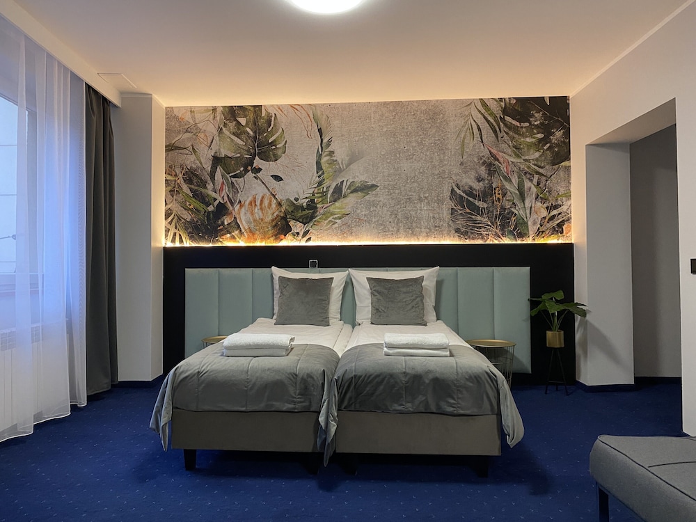 Deluxe Quadruple Room - Photo 1