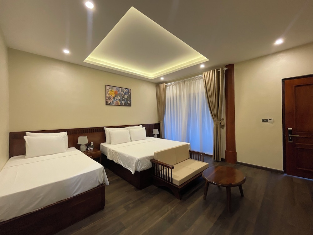 Deluxe Triple Room, Garden View photo 2