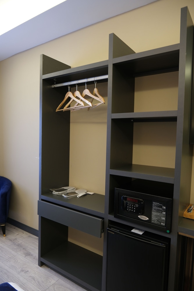 Deluxe Triple Room - Photo 17