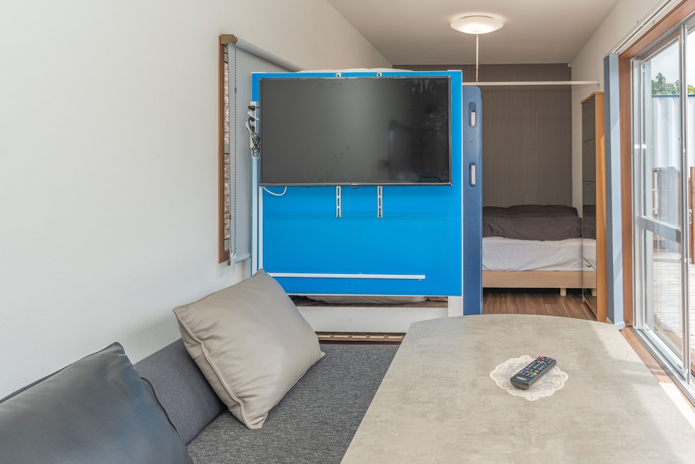Family Studio, Multiple Beds, Bathtub, Partial Ocean View photo 1