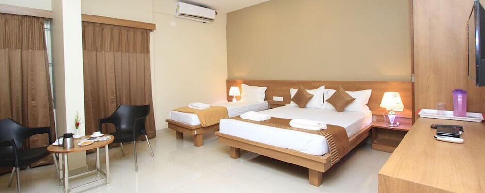 Deluxe Triple Room, Multiple Beds, Non Smoking, City View photo 1