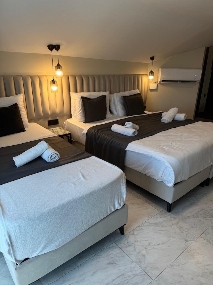 Deluxe Triple Room - Photo 7
