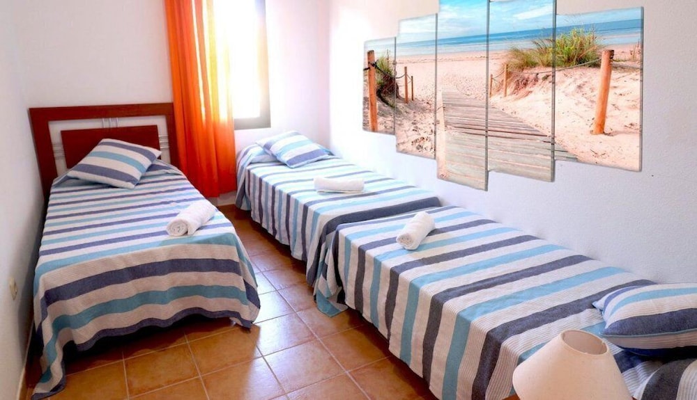 Dormitorio Compartido, Baño Compartido