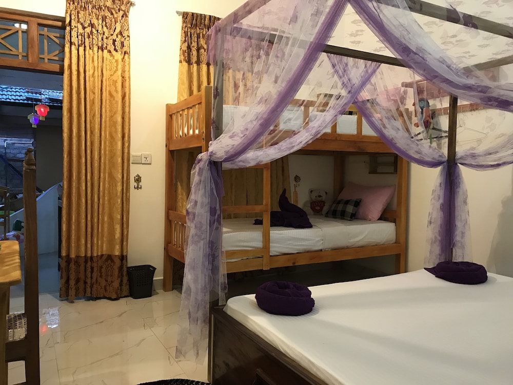 Family Room, Multiple Beds, Non Smoking, Garden View photo 1
