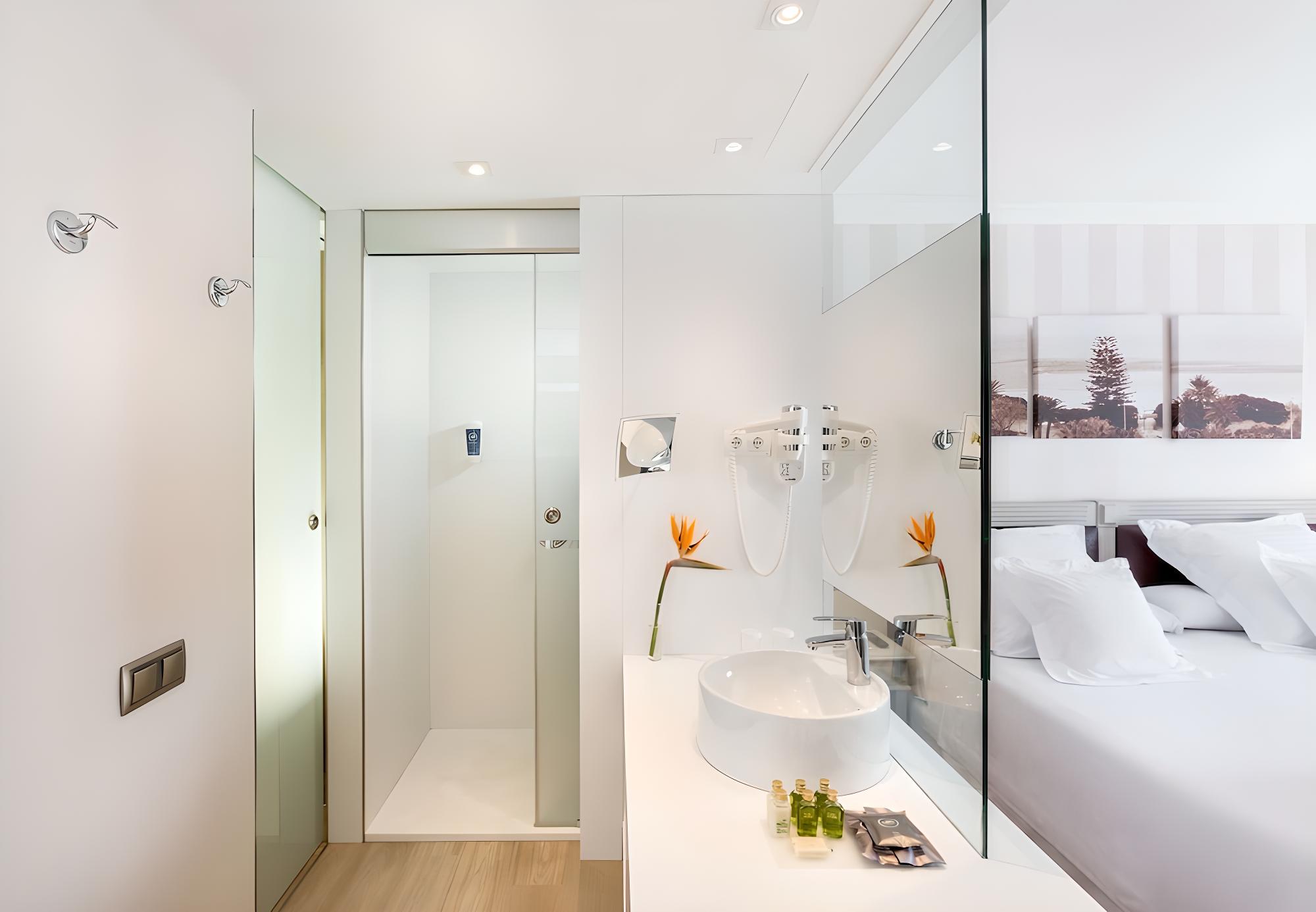 Relax in this modern and stylish bathroom retreat.