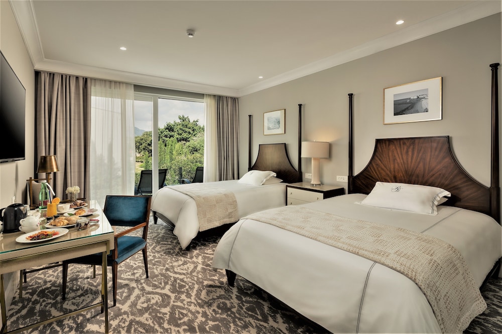 Deluxe Quadruple Room, 2 Queen Beds, Balcony