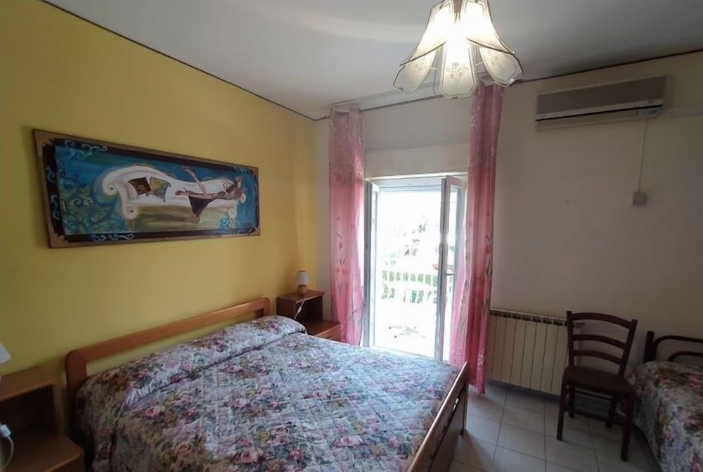 Double Room (with 2 extra beds)