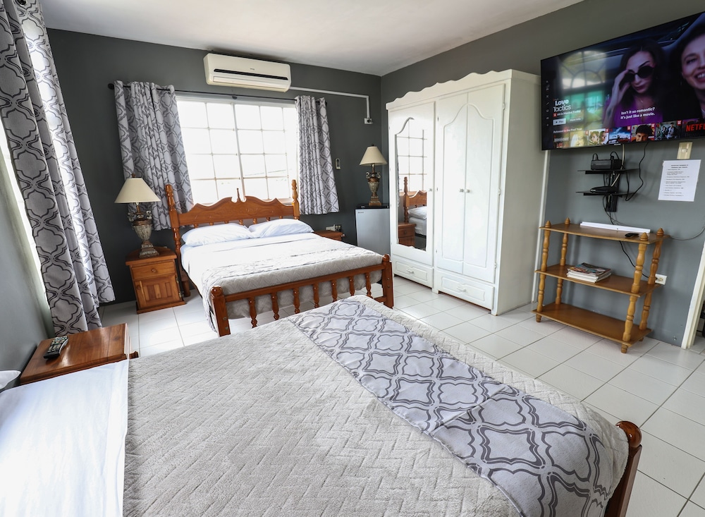 Comfort Quadruple Room, 2 Double Beds, Refrigerator, Garden View photo 2