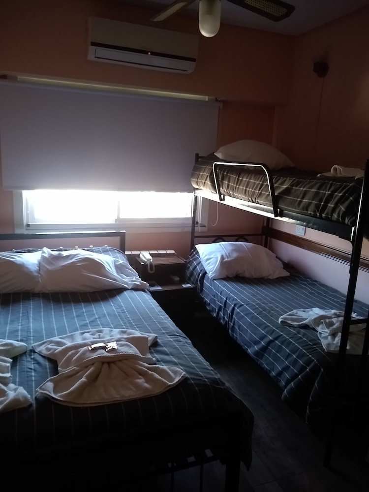 Economy Quadruple Room, City View photo 2