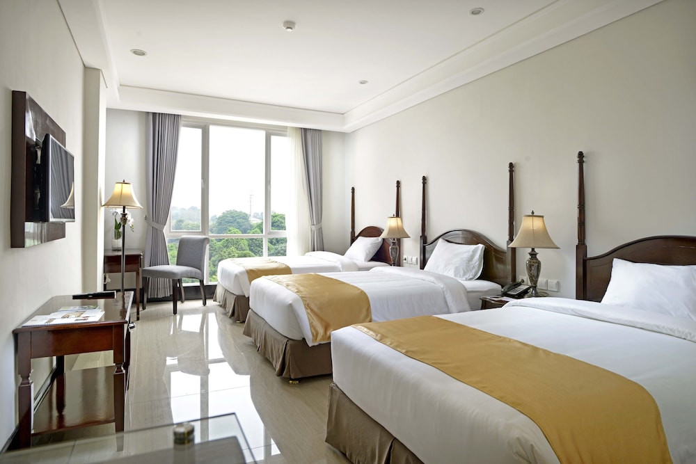 Deluxe Triple Room - Photo 1