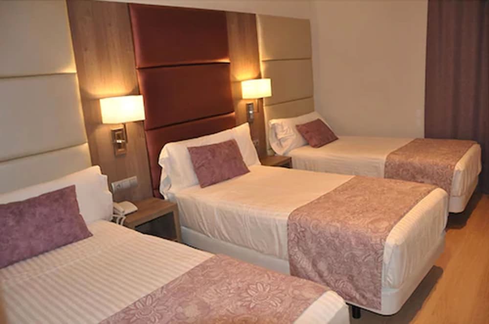 Triple Room - Photo 1