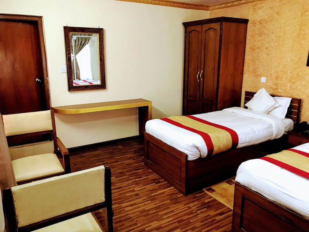Deluxe Double or Twin Room, 2 Bedrooms, Garden View photo 2