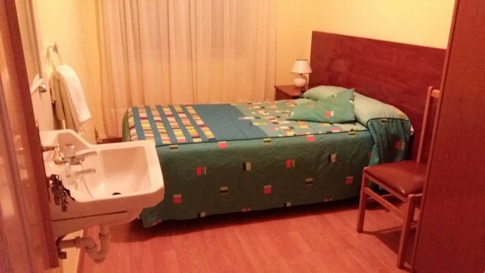 Habitación individual, baño compartido