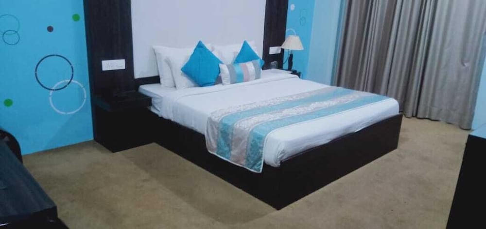 Deluxe Room - Photo 1