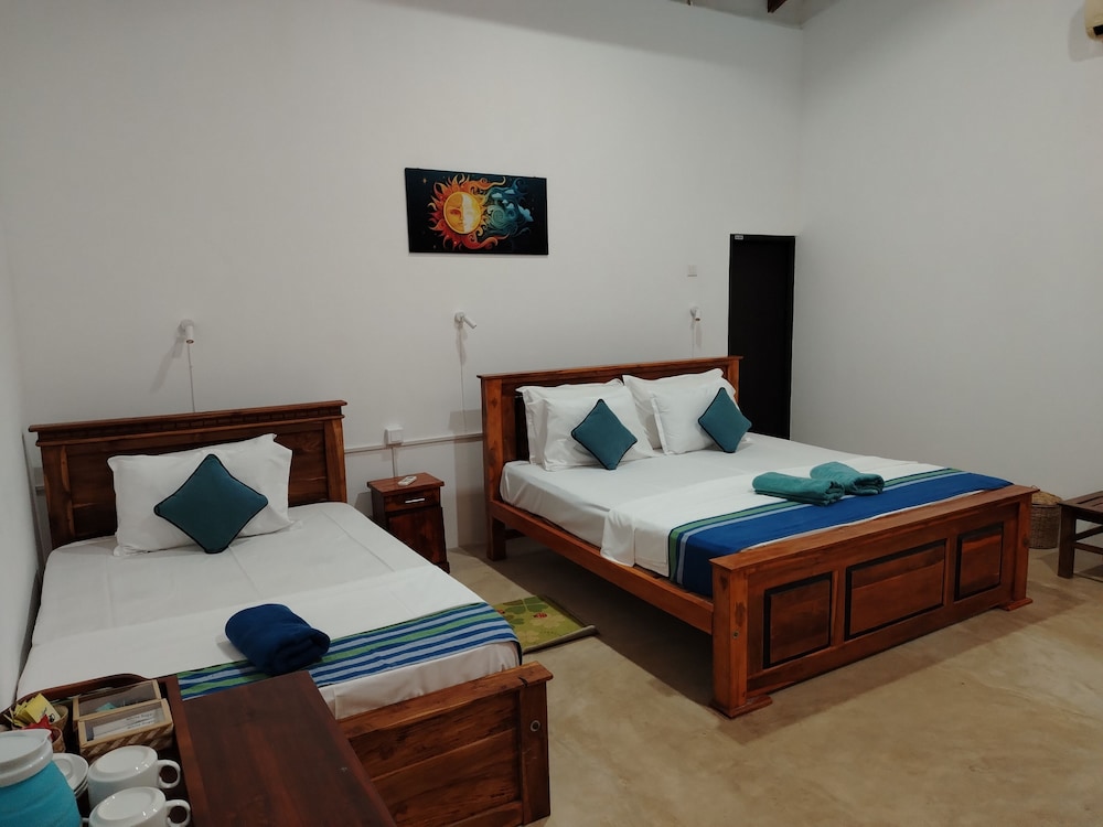 Deluxe Triple Room, Garden View photo 1
