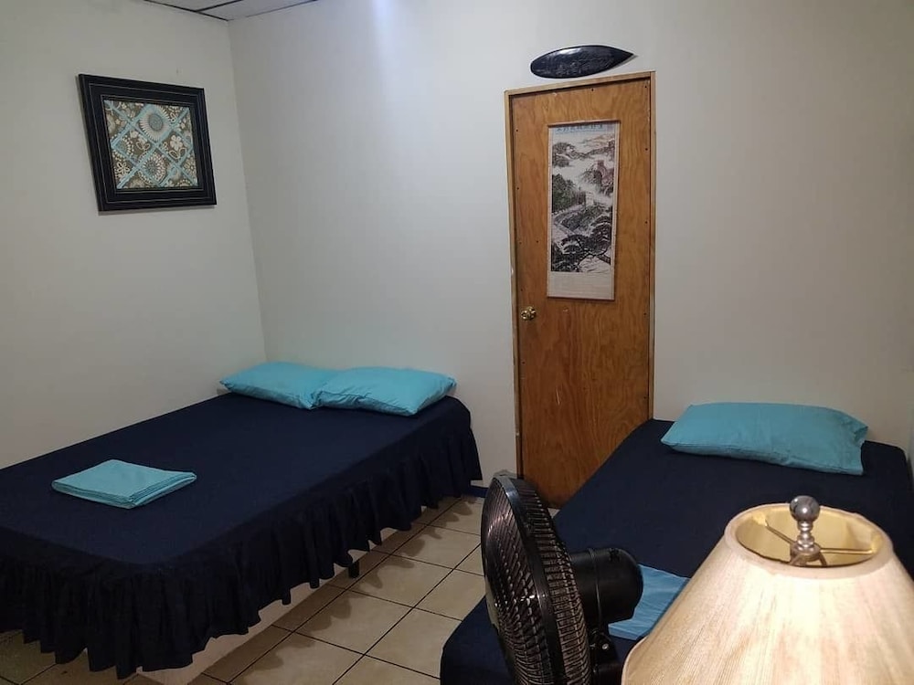 Standard Room, Multiple Beds, Private Bathroom photo 1