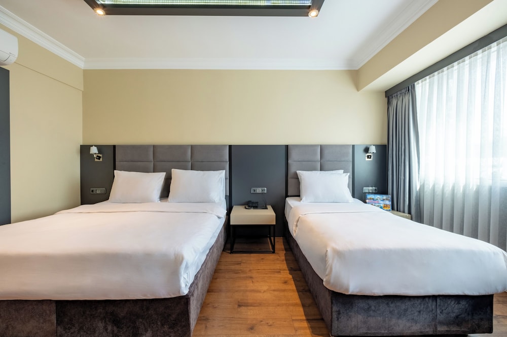 Family Triple Room - Photo 1
