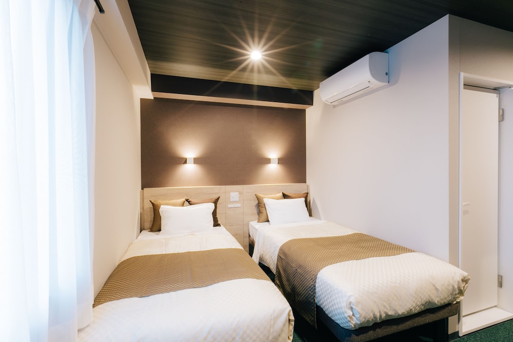 Twin Room - Photo 1