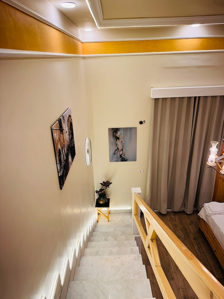 Deluxe Quadruple Room - Photo 7