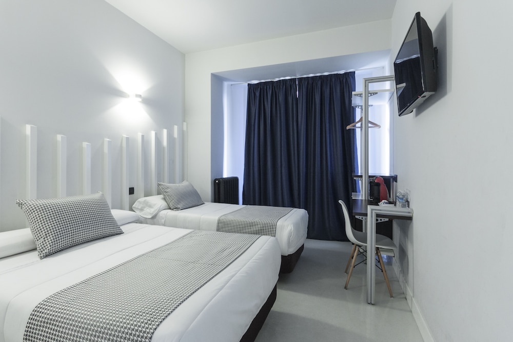 Habitación Triple con Vista a la Ciudad