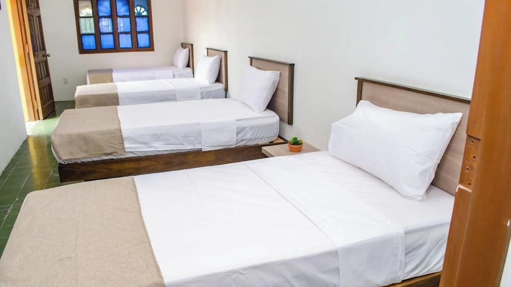Deluxe Quadruple Room, Courtyard View