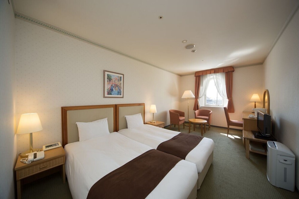 Standard Triple Room (2 single + 1 extra bed), Non Smoking photo 1