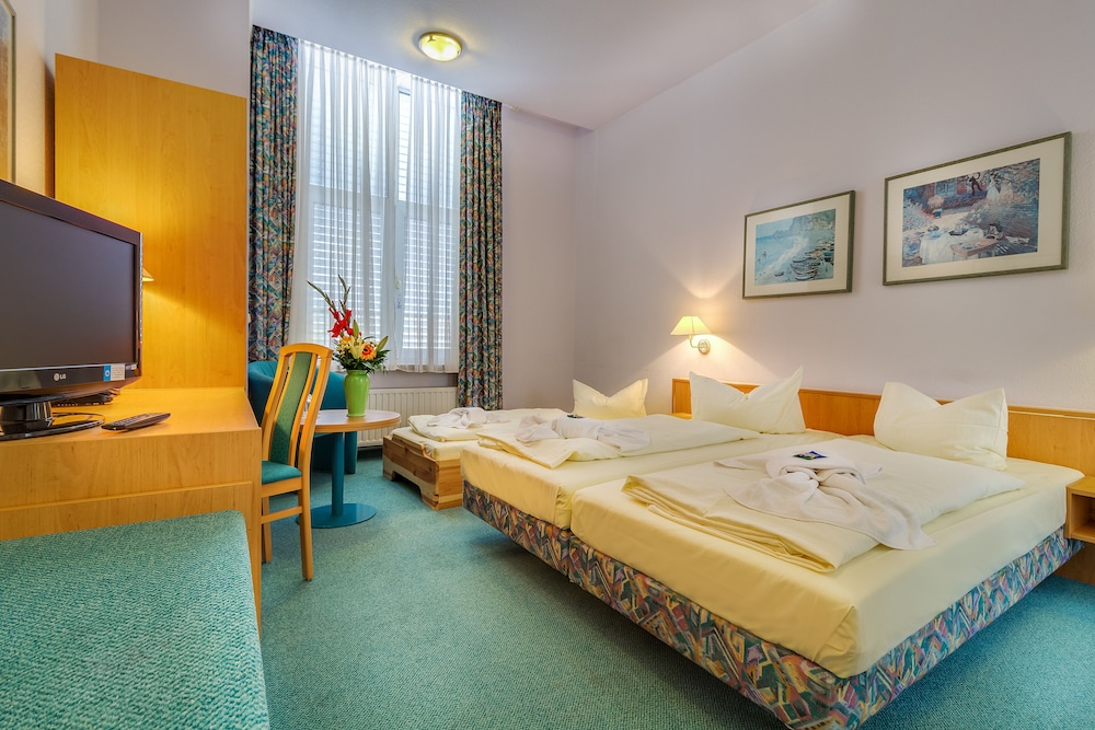 Triple Room - Photo 1