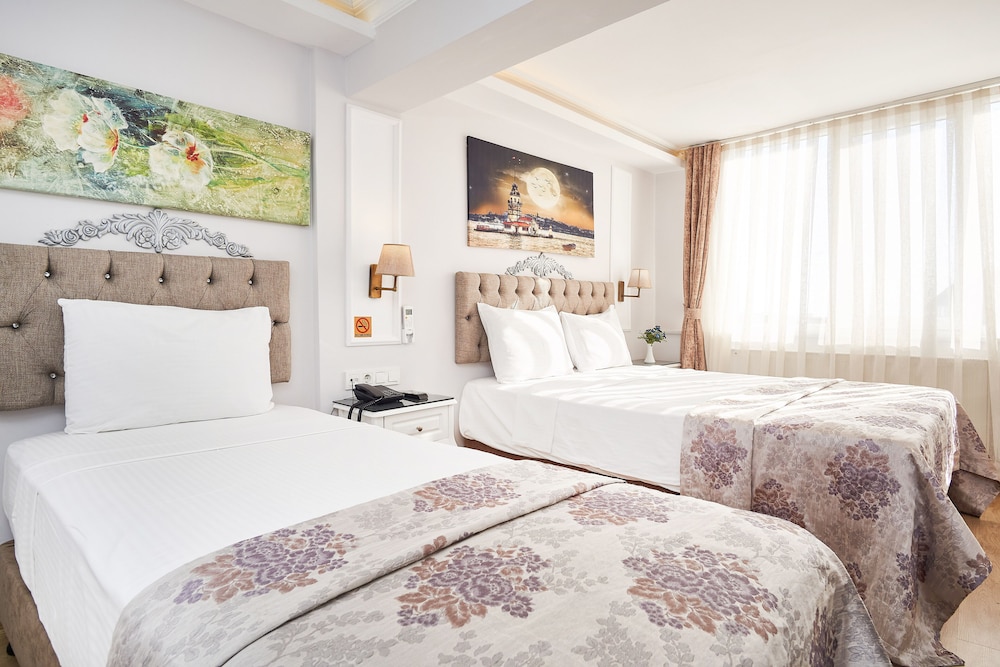 Economy Triple Room, Courtyard View photo 1