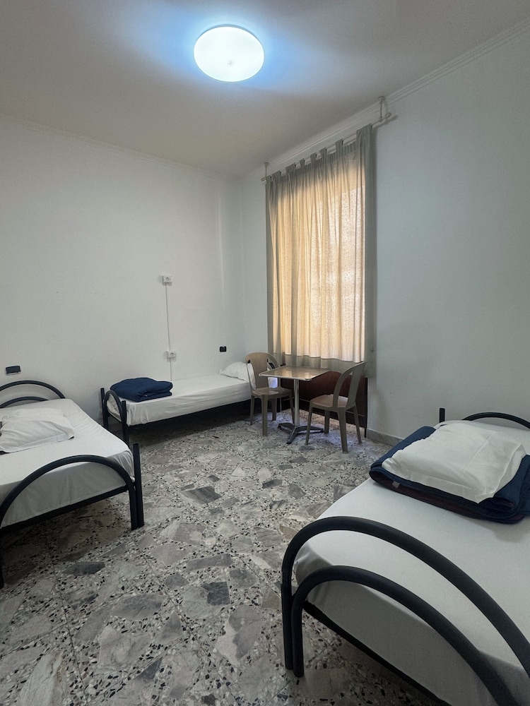 4 Single Bed Mixed Dorm with Private Bathroom