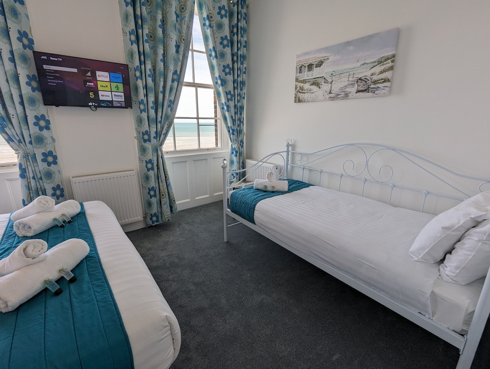 Triple Room, Multiple Beds, Beach View photo 2