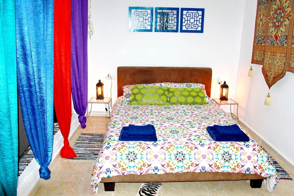 Habitación Triple, con vista al jardín