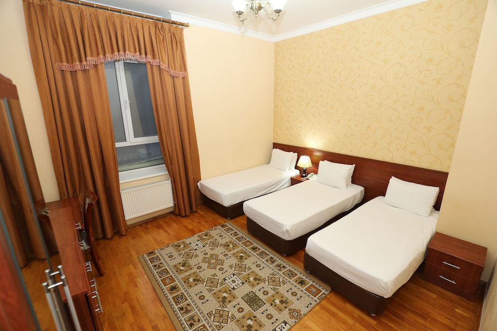 Classic Triple Room, City View