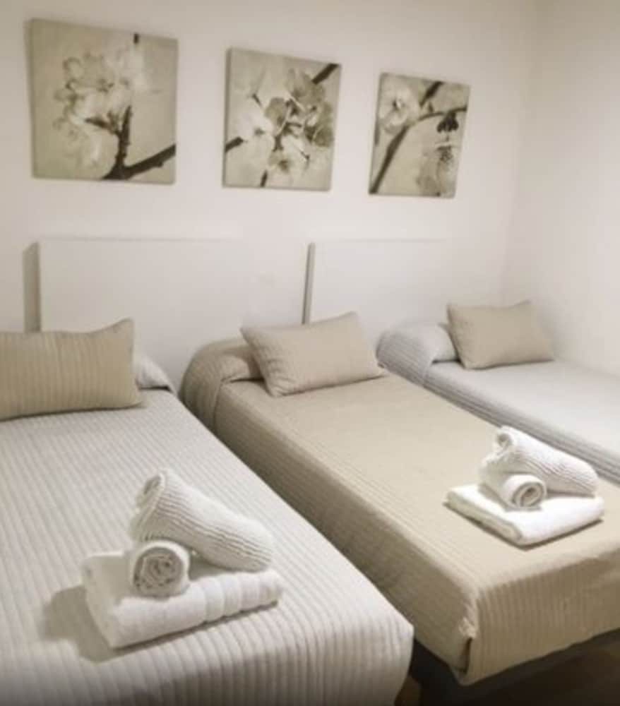 Habitación Triple, Baño Compartido
