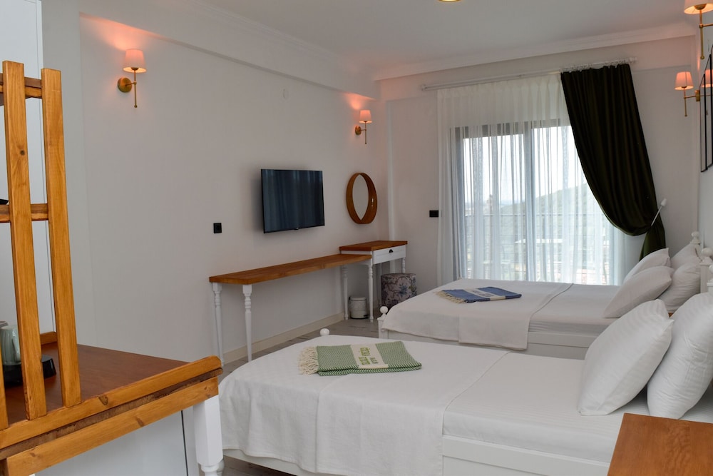 Deluxe Triple Room, Balcony, Sea View - Photo 13