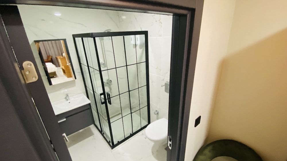 Elite Quadruple Room, 2 Bedrooms, Smoking, City View photo 2